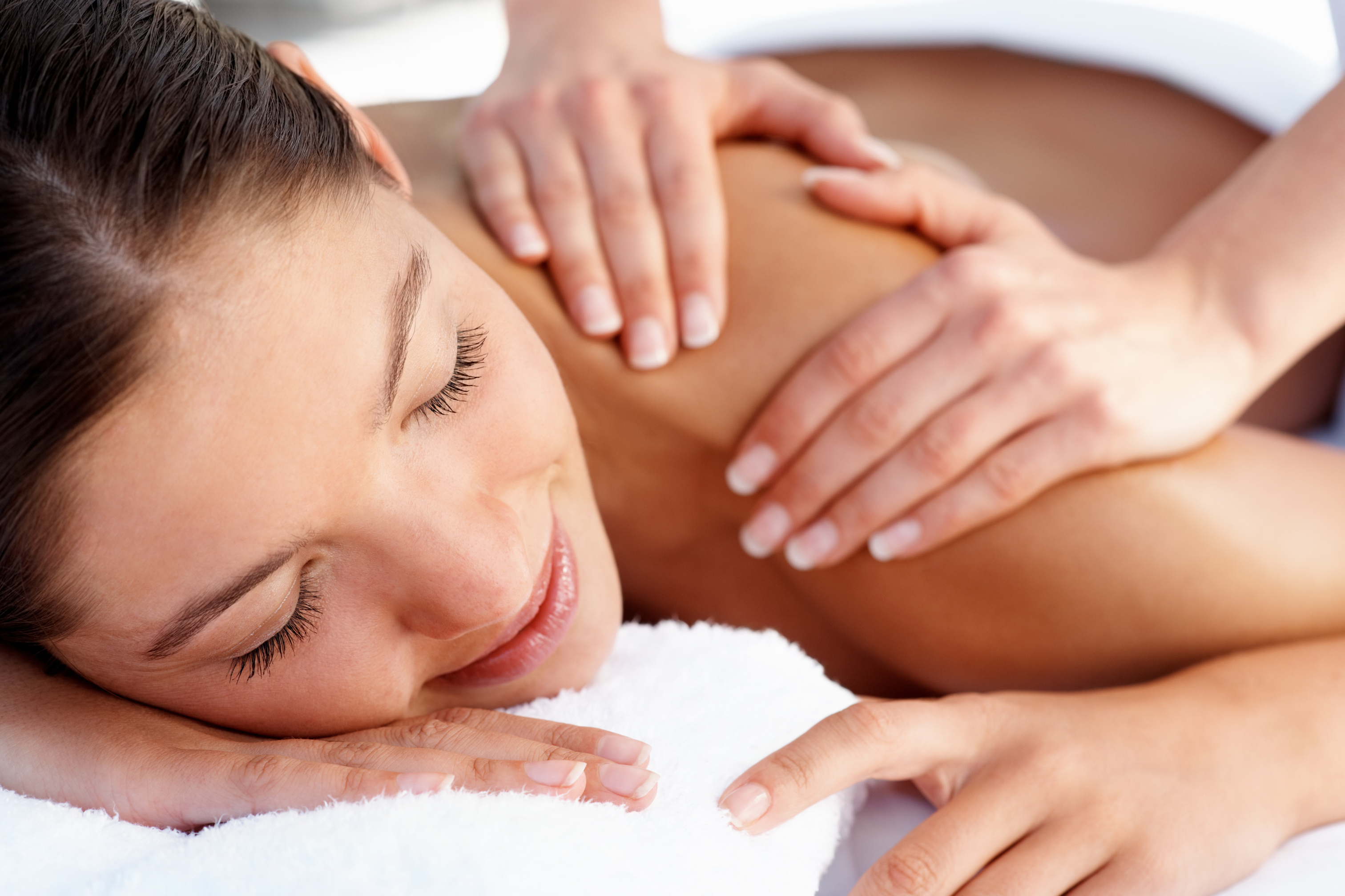 Young Woman Receiving a Body Massage